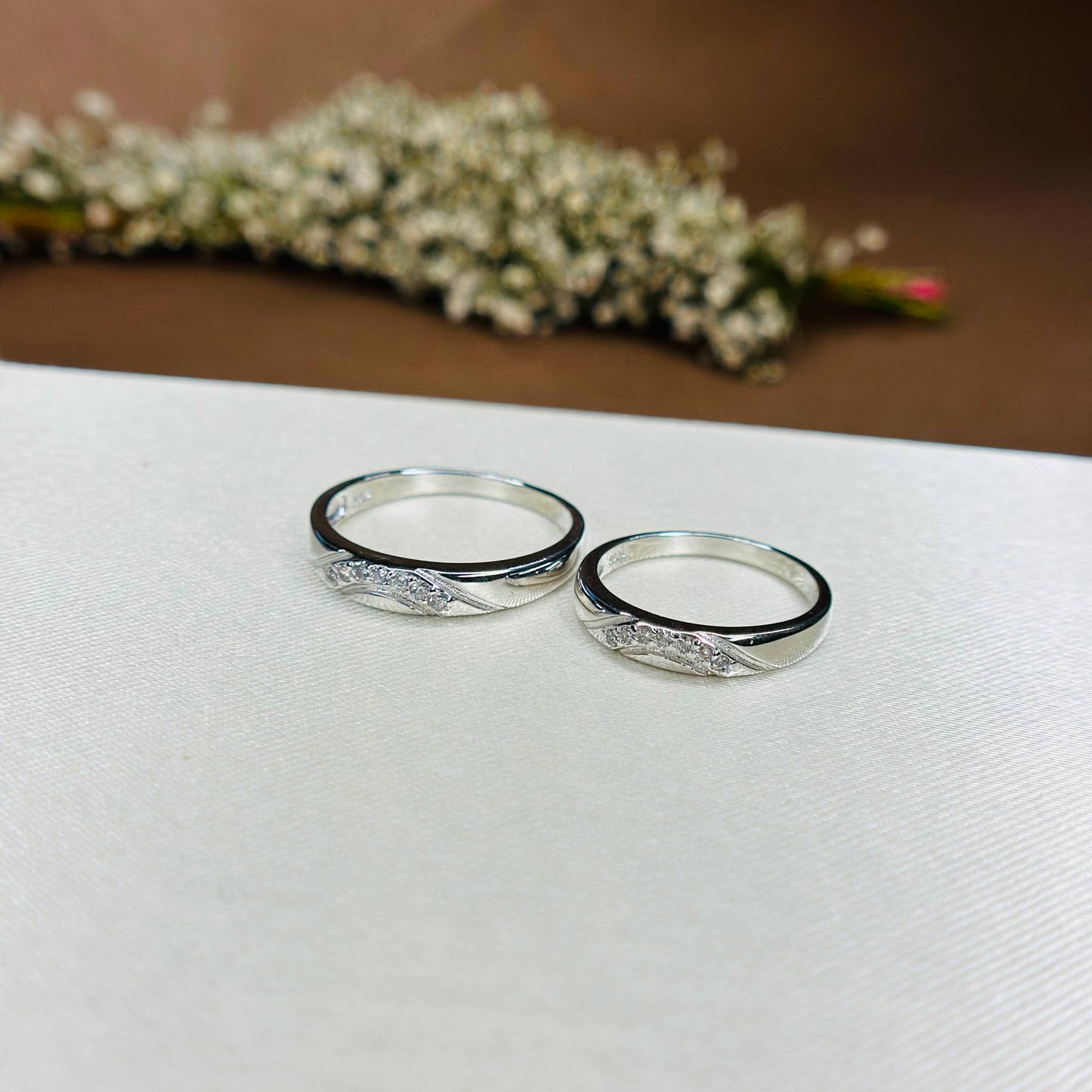 Twist Design Couple Rings in Pure 925 Silver with CZ Detailing